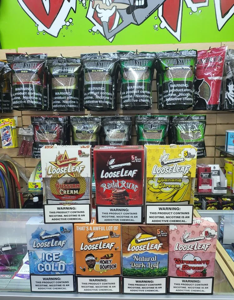 A store display showcasing a variety of cigarette brands and types.
